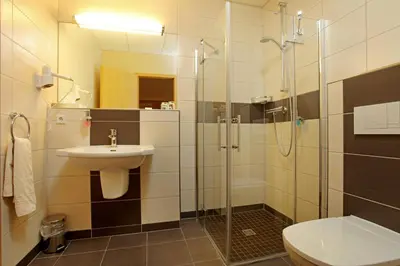 Ein Badezimmer in der Unterkunft Sporthotel Neuruppin