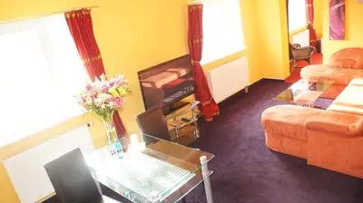 Ein Sitzbereich in der Unterkunft Hotel am Buschkrugpark