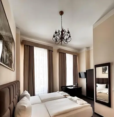 Ein Bett oder Betten in einem Zimmer der Unterkunft Upper Room Hotel Kurfürstendamm
