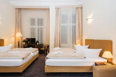 Ein Bett oder Betten in einem Zimmer der Unterkunft Upper Room Hotel Kurfürstendamm