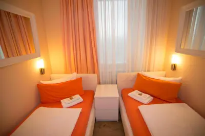 Ein Bett oder Betten in einem Zimmer der Unterkunft City Guesthouse Pension Berlin