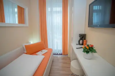 Ein Bett oder Betten in einem Zimmer der Unterkunft City Guesthouse Pension Berlin
