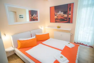 Ein Bett oder Betten in einem Zimmer der Unterkunft City Guesthouse Pension Berlin