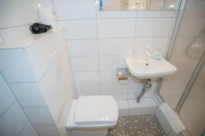 Ein Badezimmer in der Unterkunft City Guesthouse Pension Berlin