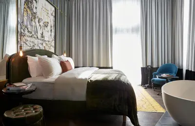 Ein Bett oder Betten in einem Zimmer der Unterkunft Sir Savigny Hotel, part of Sircle Collection