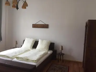 Ein Bett oder Betten in einem Zimmer der Unterkunft Rathaus-Pension 1685