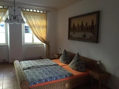 Ein Bett oder Betten in einem Zimmer der Unterkunft Rathaus-Pension 1685