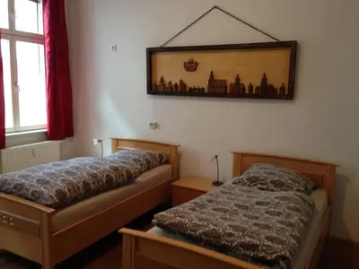 Ein Bett oder Betten in einem Zimmer der Unterkunft Rathaus-Pension 1685