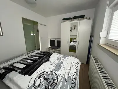 Ein Bett oder Betten in einem Zimmer der Unterkunft Ferienwohnung vor den Toren Berlins