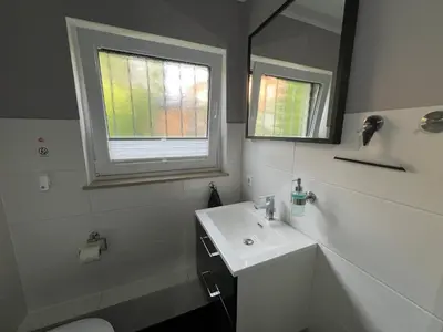Ein Badezimmer in der Unterkunft Ferienwohnung vor den Toren Berlins