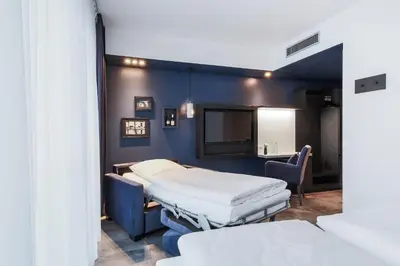 Ein Bett oder Betten in einem Zimmer der Unterkunft LINDEMANN'S
