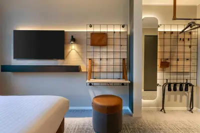 Ein Bett oder Betten in einem Zimmer der Unterkunft Moxy Berlin Ostbahnhof