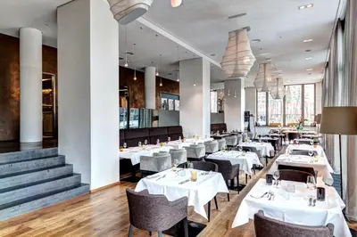 Ein Restaurant oder anderes Speiselokal in der Unterkunft COSMO Hotel Berlin Mitte