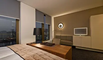 Ein Bett oder Betten in einem Zimmer der Unterkunft COSMO Hotel Berlin Mitte