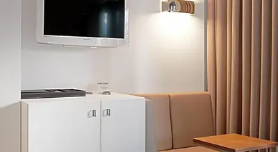 Küche/Küchenzeile in der Unterkunft COSMO Hotel Berlin Mitte