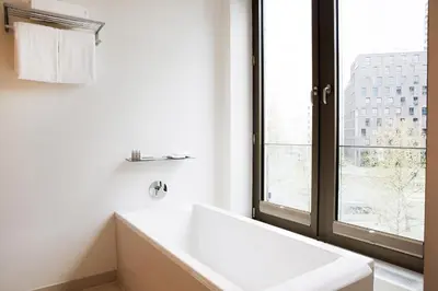 Ein Badezimmer in der Unterkunft COSMO Hotel Berlin Mitte