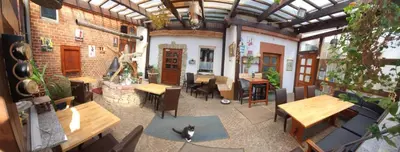 Ein Restaurant oder anderes Speiselokal in der Unterkunft Gasthof Alte Fischerhütte