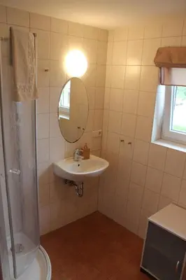 Ein Badezimmer in der Unterkunft Ferienwohnungen Margaretenhof am Plauer See