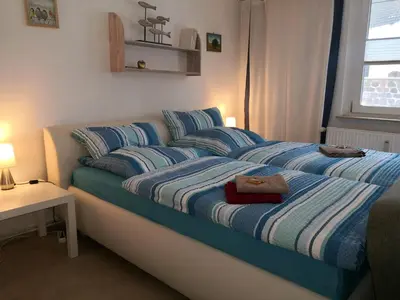 Ein Bett oder Betten in einem Zimmer der Unterkunft Ferienwohnung Wroblewsky