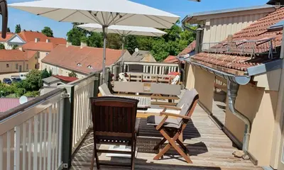 Ein Balkon oder eine Terrasse in der Unterkunft LoggiaHaus am Schloss, 5 Ferienwohnungen, teils mit Schloss- und Seeblick