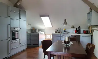 Küche/Küchenzeile in der Unterkunft LoggiaHaus am Schloss, 5 Ferienwohnungen, teils mit Schloss- und Seeblick