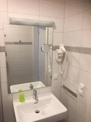 Ein Badezimmer in der Unterkunft Bergschlößchen