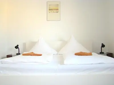 Ein Bett oder Betten in einem Zimmer der Unterkunft Rooms & Apartments near Zoologischer Garten