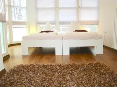 Ein Bett oder Betten in einem Zimmer der Unterkunft Rooms & Apartments near Zoologischer Garten