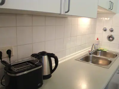 Küche/Küchenzeile in der Unterkunft Rooms & Apartments near Zoologischer Garten