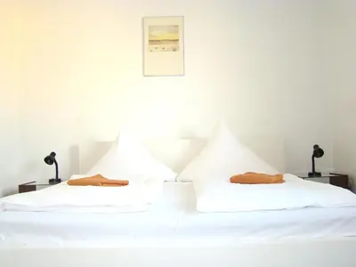 Ein Bett oder Betten in einem Zimmer der Unterkunft Rooms & Apartments near Zoologischer Garten