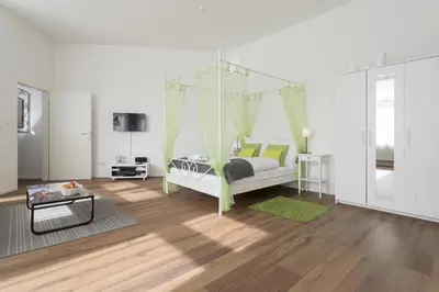 Ein Bett oder Betten in einem Zimmer der Unterkunft Studio Apartment Niemetzstr 51