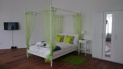 Ein Bett oder Betten in einem Zimmer der Unterkunft Studio Apartment Niemetzstr 51