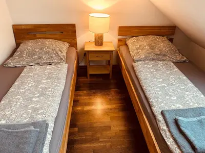 Ein Bett oder Betten in einem Zimmer der Unterkunft Moderne Wohnung im Grünen in WRN