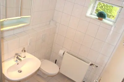 Ein Badezimmer in der Unterkunft Doppelzimmer - Monteurswohnung - Arbeiterwohnung 4-8 Personen