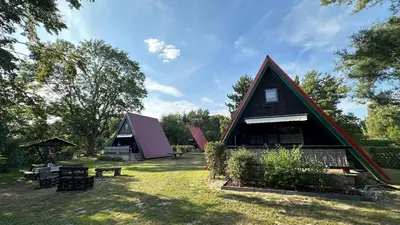 Ein Garten an der Unterkunft Finnhütten Waldesruh