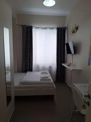 Ein Bett oder Betten in einem Zimmer der Unterkunft Elifim