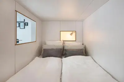 Ein Bett oder Betten in einem Zimmer der Unterkunft Modern Design Apartment