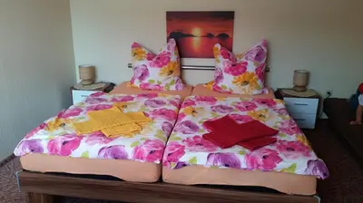 Ein Bett oder Betten in einem Zimmer der Unterkunft Zimmervermietung M&R Bertuch