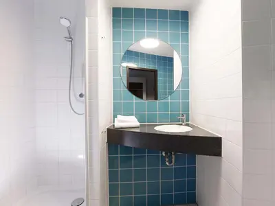 Ein Badezimmer in der Unterkunft B&B Hotel Potsdam