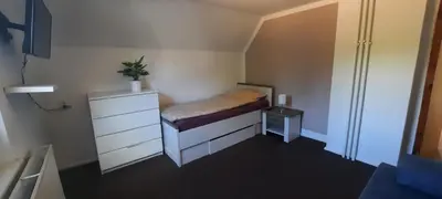 Ein Bett oder Betten in einem Zimmer der Unterkunft Ferienhaus im Grünen/Monteurzimmer