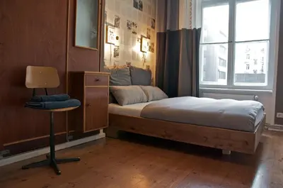 Ein Bett oder Betten in einem Zimmer der Unterkunft Linnen Luxx Apartment