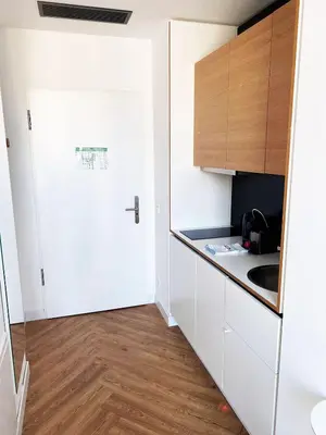 Küche/Küchenzeile in der Unterkunft smartments Berlin City West