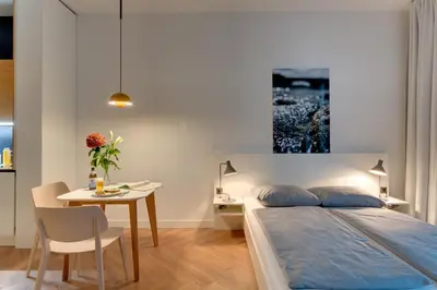 Ein Bett oder Betten in einem Zimmer der Unterkunft smartments Berlin City West