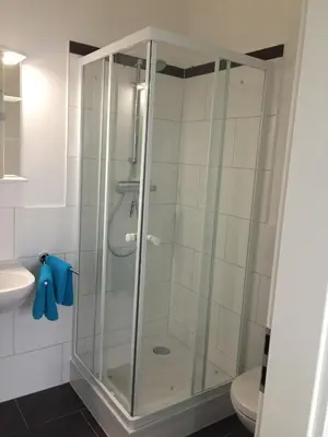Ein Badezimmer in der Unterkunft A10 Apartmenthaus