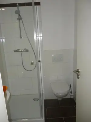 Ein Badezimmer in der Unterkunft A10 Apartmenthaus