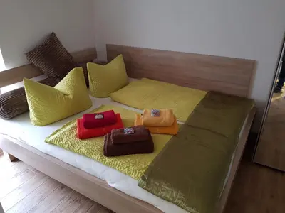 Ein Bett oder Betten in einem Zimmer der Unterkunft Ferienhaus in Bernau bei Berlin