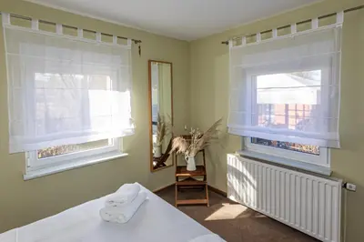 Ein Bett oder Betten in einem Zimmer der Unterkunft Spreewaldhäuser am See