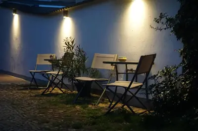 Ein Garten an der Unterkunft Pension zum Birnbaum