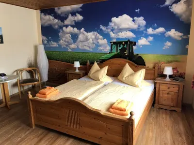 Ein Bett oder Betten in einem Zimmer der Unterkunft Hotel Schützenhaus