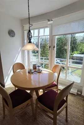 Ein Sitzbereich in der Unterkunft Ferienwohnung Seestern